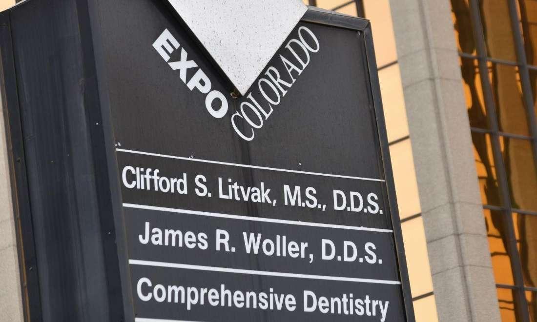 Exterior street sign for dentist office in Cherry Creek Denver